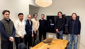 Students in a conference room at ASTER